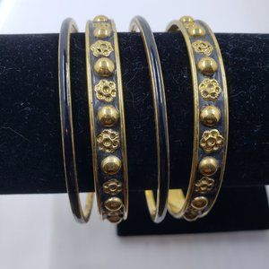 Gold Tone and Black Bracelets